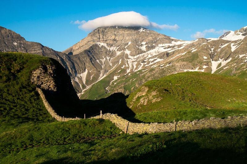 Trinserhorn (Piz Dolf) with foehn cloud. Photo location: Gamserälpli Obersäss in Calfeisental Trinserhorn (Piz Dolf) with foehn cloud. Photo location: Gamserälpli Obersäss in Calfeisental